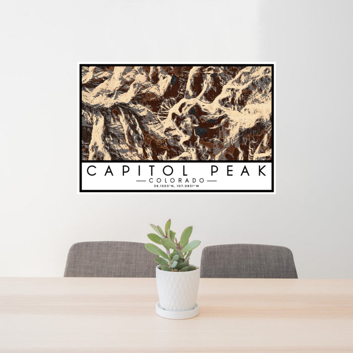 24x36 Capitol Peak Colorado Map Print Lanscape Orientation in Ember Style Behind 2 Chairs Table and Potted Plant