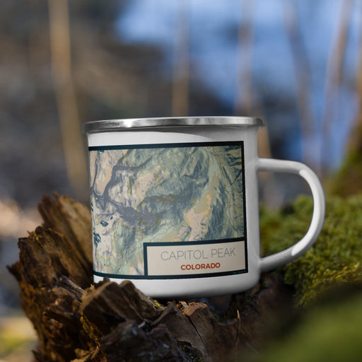 Right View Custom Capitol Peak Colorado Map Enamel Mug in Woodblock on Grass With Trees in Background