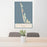 24x36 Captiva Island Florida Map Print Portrait Orientation in Woodblock Style Behind 2 Chairs Table and Potted Plant