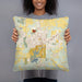 Person holding 18x18 Custom Carbondale Illinois Map Throw Pillow in Woodblock
