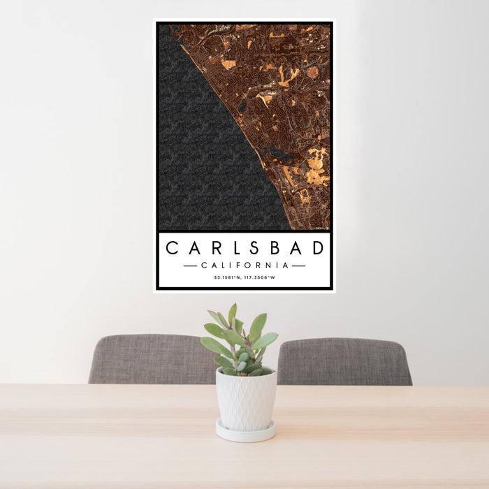 24x36 Carlsbad California Map Print Portrait Orientation in Ember Style Behind 2 Chairs Table and Potted Plant