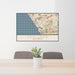 24x36 Carlsbad California Map Print Lanscape Orientation in Woodblock Style Behind 2 Chairs Table and Potted Plant