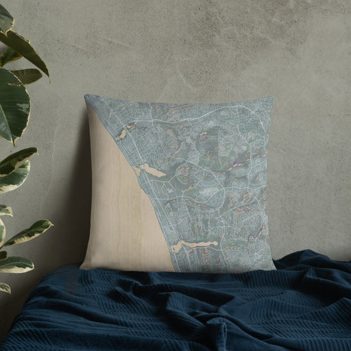 Custom Carlsbad California Map Throw Pillow in Afternoon on Bedding Against Wall