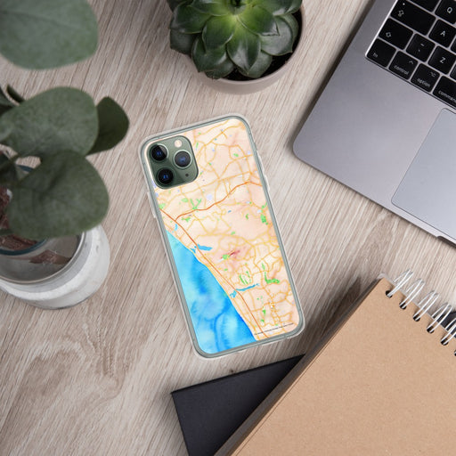 Custom Carlsbad California Map Phone Case in Watercolor on Table with Laptop and Plant