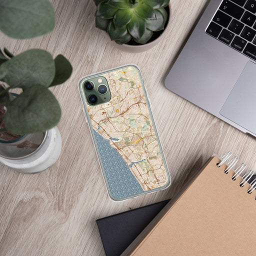 Custom Carlsbad California Map Phone Case in Woodblock on Table with Laptop and Plant
