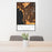 24x36 Carmel-by-the-Sea California Map Print Portrait Orientation in Ember Style Behind 2 Chairs Table and Potted Plant