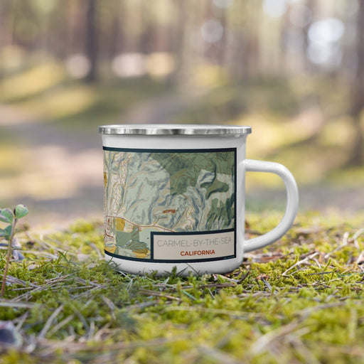 Right View Custom Carmel-by-the-Sea California Map Enamel Mug in Woodblock on Grass With Trees in Background