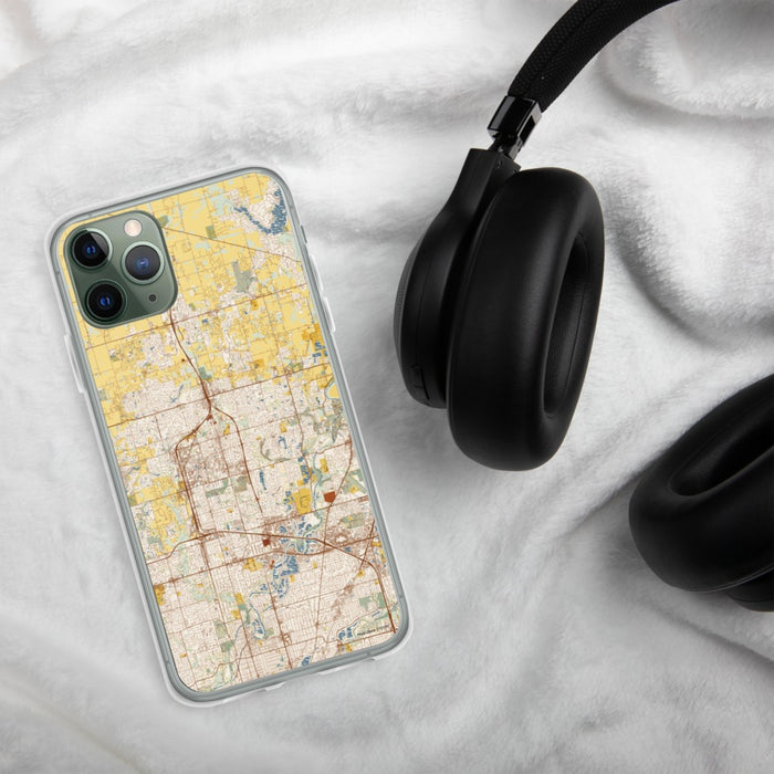 Custom Carmel Indiana Map Phone Case in Woodblock on Table with Black Headphones