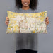 Person holding 20x12 Custom Carmel Indiana Map Throw Pillow in Woodblock