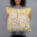 Person holding 18x18 Custom Carmel Indiana Map Throw Pillow in Woodblock