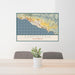 24x36 Carpinteria California Map Print Lanscape Orientation in Woodblock Style Behind 2 Chairs Table and Potted Plant