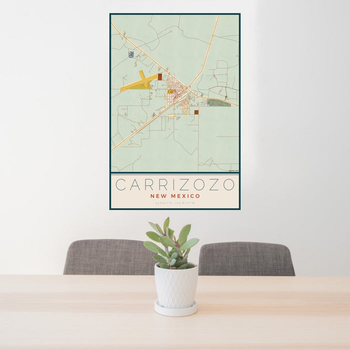 24x36 Carrizozo New Mexico Map Print Portrait Orientation in Woodblock Style Behind 2 Chairs Table and Potted Plant