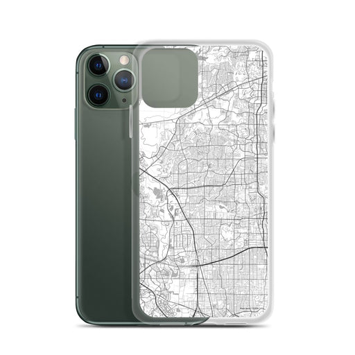 Custom Carrollton Texas Map Phone Case in Classic on Table with Laptop and Plant