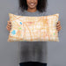 Person holding 20x12 Custom Carrollton Texas Map Throw Pillow in Watercolor