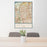 24x36 Carrollton Texas Map Print Portrait Orientation in Woodblock Style Behind 2 Chairs Table and Potted Plant