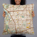 Person holding 22x22 Custom Carrollton Texas Map Throw Pillow in Woodblock