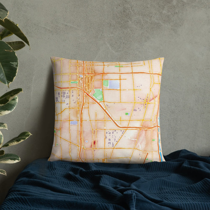 Custom Carson California Map Throw Pillow in Watercolor on Bedding Against Wall