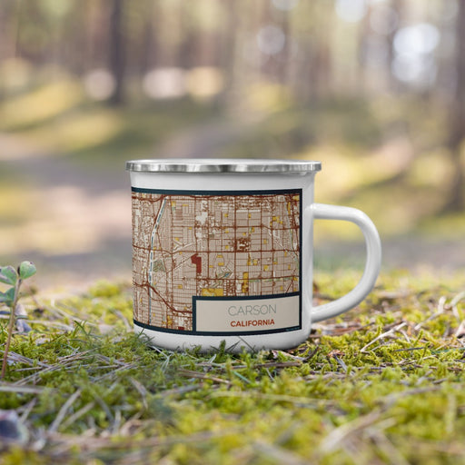 Right View Custom Carson California Map Enamel Mug in Woodblock on Grass With Trees in Background