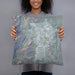 Person holding 18x18 Custom Carson City Nevada Map Throw Pillow in Afternoon