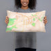 Person holding 20x12 Custom Carson City Nevada Map Throw Pillow in Watercolor