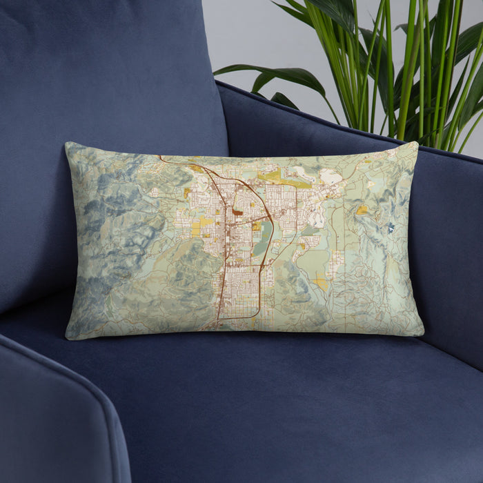 Custom Carson City Nevada Map Throw Pillow in Woodblock on Blue Colored Chair