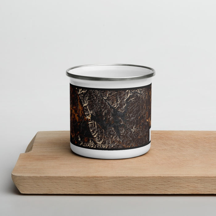 Front View Custom Carters Lake Georgia Map Enamel Mug in Ember on Cutting Board