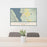 24x36 Cascade Idaho Map Print Lanscape Orientation in Woodblock Style Behind 2 Chairs Table and Potted Plant