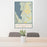 24x36 Cascade Idaho Map Print Portrait Orientation in Woodblock Style Behind 2 Chairs Table and Potted Plant
