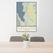 24x36 Cascade Idaho Map Print Portrait Orientation in Woodblock Style Behind 2 Chairs Table and Potted Plant