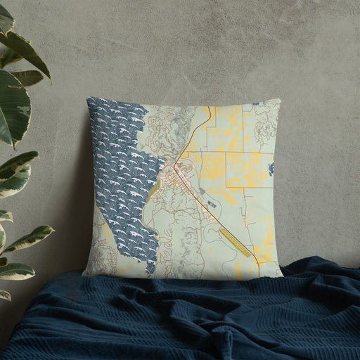 Custom Cascade Idaho Map Throw Pillow in Woodblock on Bedding Against Wall