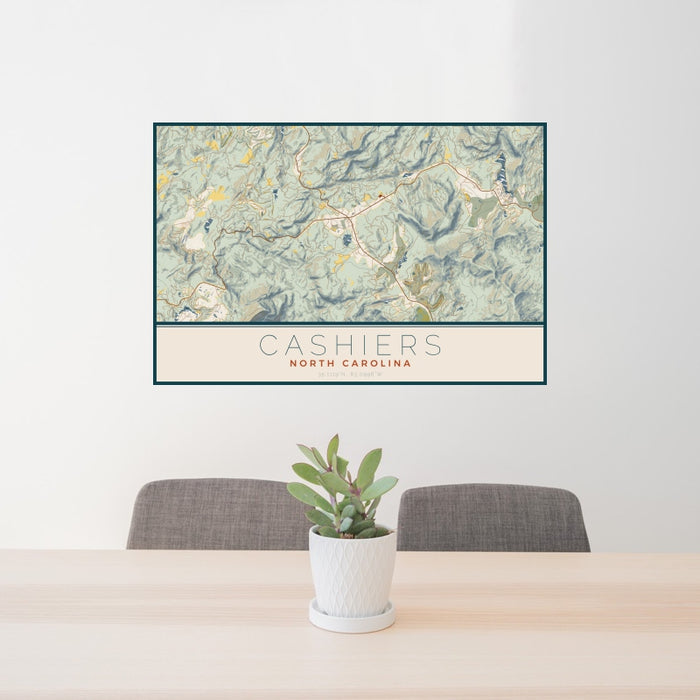 24x36 Cashiers North Carolina Map Print Landscape Orientation in Woodblock Style Behind 2 Chairs Table and Potted Plant