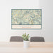 24x36 Cashiers North Carolina Map Print Landscape Orientation in Woodblock Style Behind 2 Chairs Table and Potted Plant