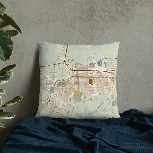 Custom Casper Wyoming Map Throw Pillow in Woodblock on Bedding Against Wall