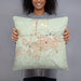 Person holding 18x18 Custom Casper Wyoming Map Throw Pillow in Woodblock
