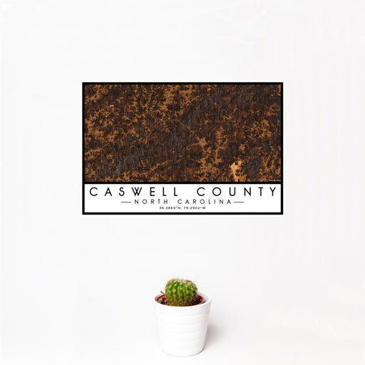 12x18 Caswell County North Carolina Map Print Landscape Orientation in Ember Style With Small Cactus Plant in White Planter