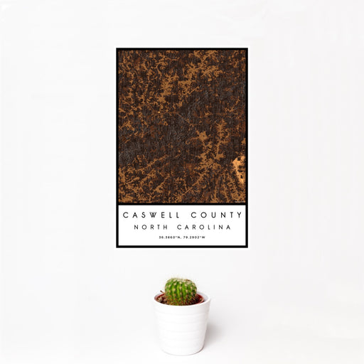 12x18 Caswell County North Carolina Map Print Portrait Orientation in Ember Style With Small Cactus Plant in White Planter