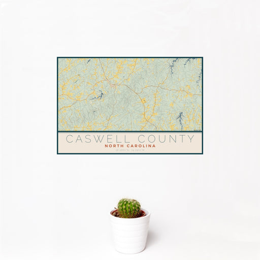 12x18 Caswell County North Carolina Map Print Landscape Orientation in Woodblock Style With Small Cactus Plant in White Planter