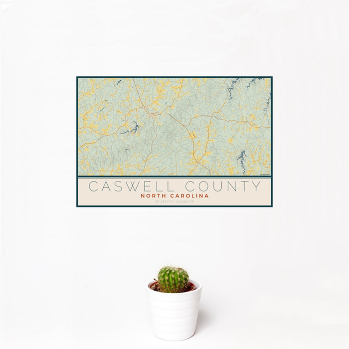 12x18 Caswell County North Carolina Map Print Landscape Orientation in Woodblock Style With Small Cactus Plant in White Planter