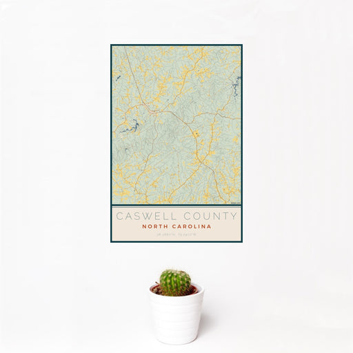 12x18 Caswell County North Carolina Map Print Portrait Orientation in Woodblock Style With Small Cactus Plant in White Planter