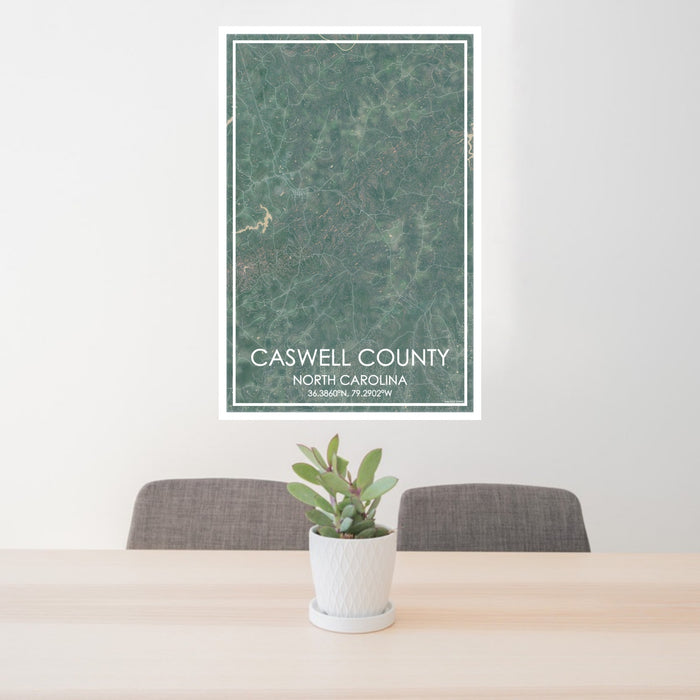 24x36 Caswell County North Carolina Map Print Portrait Orientation in Afternoon Style Behind 2 Chairs Table and Potted Plant