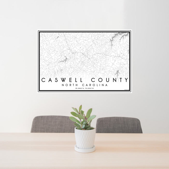 24x36 Caswell County North Carolina Map Print Lanscape Orientation in Classic Style Behind 2 Chairs Table and Potted Plant
