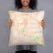 Person holding 18x18 Custom Cathedral City California Map Throw Pillow in Watercolor