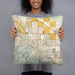Person holding 18x18 Custom Cathedral City California Map Throw Pillow in Woodblock