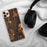 Custom Catskill New York Map Phone Case in Ember on Table with Black Headphones