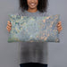 Person holding 20x12 Custom Cedar City Utah Map Throw Pillow in Afternoon
