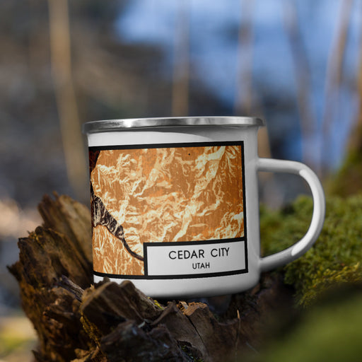 Right View Custom Cedar City Utah Map Enamel Mug in Ember on Grass With Trees in Background