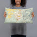 Person holding 20x12 Custom Cedar City Utah Map Throw Pillow in Woodblock