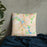 Custom Cedar Rapids Iowa Map Throw Pillow in Watercolor on Bedding Against Wall