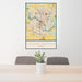 24x36 Cedar Rapids Iowa Map Print Portrait Orientation in Woodblock Style Behind 2 Chairs Table and Potted Plant