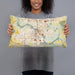 Person holding 20x12 Custom Cedar Rapids Iowa Map Throw Pillow in Woodblock